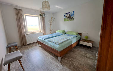 Foto: Wohnung 'Kuh Bella' - das Schlafzimmer